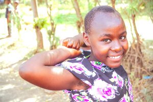 Stef Styles|The Traveller|Bright Up Dull Day - A little girl. Tanzania