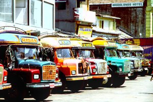 Stef Styles|Night|Grunge with Green Midtones - Some colourful busses. Colombo / Sri Lanka
