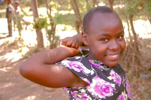 Stef Styles|Night|City lights with reflection - A little girl. Tanzania