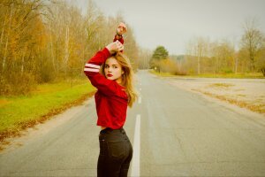 Stef Styles|The Traveller|Tropical Beach 70s - A woman on the road.