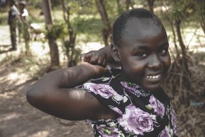 Dark Tones|Moody Dark Blue - A little girl. Tanzania